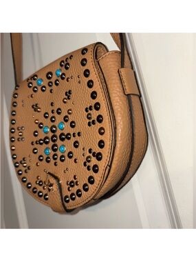 ✨ Rebecca Minkoff Studded Saddle Crossbody – Tan Leather & Turquoise Stones
